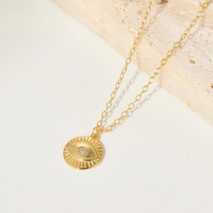 Golden S925 silver necklace with sparkling cubic zirconia Evil Eye pendant on stone