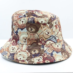 Close-up of vintage reversible bucket hat featuring colorful cartoon bear jacquard fabric