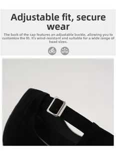 Detail view of the black cotton baseball cap with an adjustable metal strap buckle