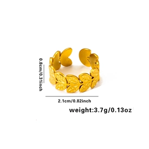 Detail view of golden adjustable ring featuring hollow leaf texture and size measurements