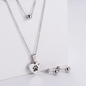 Parure en acier titane avec collier pendentif cœur patte et boucles d'oreilles perles