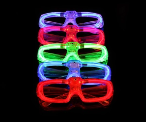 Vertical stack of five colorful LED glowing glasses on a black background with reflection