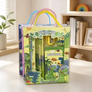 Detail view of a dinosaur stationery gift set including pencils, ruler, and mini purse