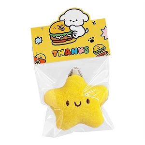 Llavero de estrella de peluche amarilla con cara sonriente y empaque de dibujos animados
