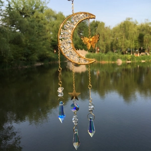 Golden moon crystal suncatcher with butterfly accent and iridescent prism pendants