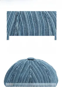 Macro detail of striped navy wool blend fabric texture on an autumn beret hat