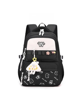 Detailed front view of student backpack with bear print and cloud plush pendant