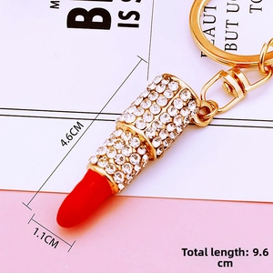 Sparkling lipstick car keychain with crystal rhinestones and red enamel top detail