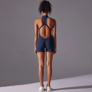Detail view of the deep blue scrunch bum romper with a racerback and open back design