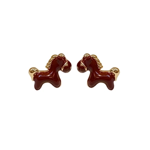 Elegant gold-plated horse stud earrings with deep red enamel glaze and metallic accents