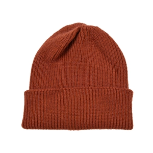Close-up of caramel ribbed knit beanie showing thick wool yarn and folded cuff texture