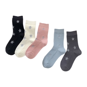 Five pairs of cotton mid-calf socks with star patterns in various stylish colors