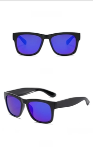 Detail view of children's black square sunglasses with blue reflective mirrored lenses