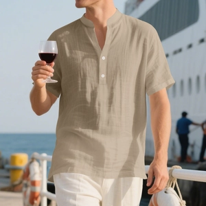 Detail of khaki men's casual linen shirt with buttoned stand collar and relaxed fit