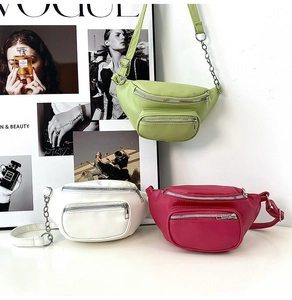 Detailed view of stylish PU leather waist bags in green, white, and rose pink with chains