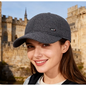 Detail of dark grey textured knit baseball cap with Sport 58 letter patch on the side