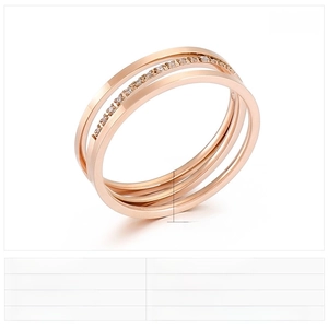 Detail of rose gold triple-layer steel ring showing dimensions and zircon inlay