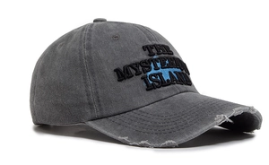 Detail of vintage grey washed cotton baseball cap with The Mysterious Island embroidery