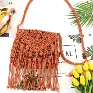 Bohemian caramel macrame woven crossbody bag with geometric patterns and fringe