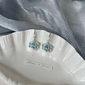 Elegant ginkgo leaf drop earrings with sparkling zircon and light blue enamel coating