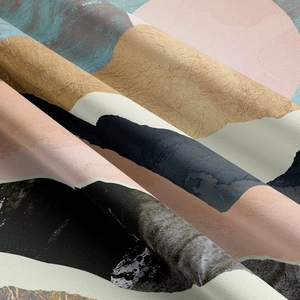 Detailed macro shot of modern abstract mountain tapestry with soft textured fabric