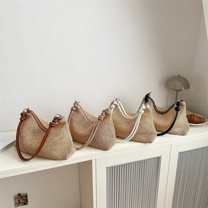 Handmade straw woven shoulder bags in four colors with stylish knotted PU handles
