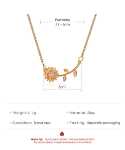 Detailed specs for golden sunflower necklace with white rhinestone and 47+5cm chain length