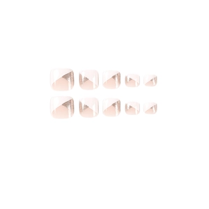 Press-on toenails featuring nude pink and rose gold glitter diagonal French design