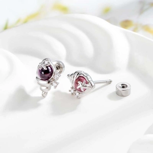 Micro-inlaid zircon conch stud earrings in silver finish with purple gemstones