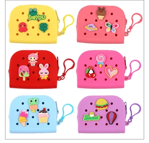 Detailed grid view of colorful silicone mini coin purses with cute DIY cartoon charms