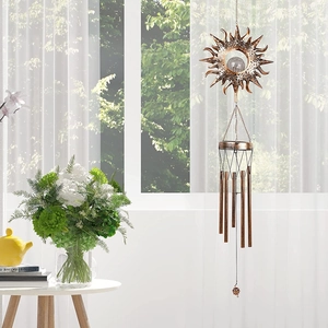 Solar sun wind chime with cracked glass ball and metal tubes in bronze finish