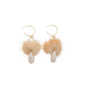 C-shaped gold earrings with light brown pompom and white drop pearl pendant