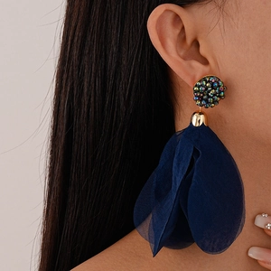 Exaggerated dark blue mesh petal tassel earrings with crystal beaded studs on model