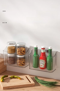 Set of two transparent wall-mounted kitchen organizers with vertical stripe texture