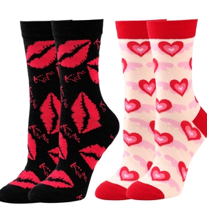Detail of cotton crew socks featuring red kiss prints and heart patterns for Valentine gift