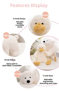Detailed view of plush white duck and polar bear dolls with soft textured fur