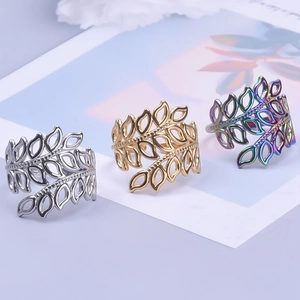 Three hollow leaf open rings in gold, silver, and iridescent finishes for men and women