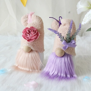Pair of plush Valentine gnomes with pink floral and purple lavender hat decorations