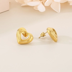 Polished 18K gold plated hollow heart studs with unique wave texture for women