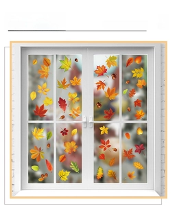 Detailed scene of autumn static window clings featuring maple leaves and acorns on glass