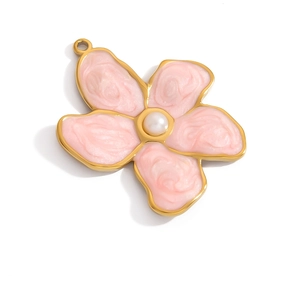 Pink enamel flower pendant with golden edges and a white pearl center on white background