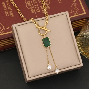 Gold stainless steel necklace with green rectangle crystal and waterdrop tassels