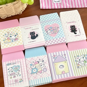 Variety of cute cartoon idol card envelopes in pastel colors and plaid patterns
