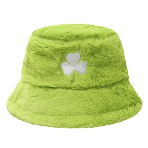 Plush green bucket hat with white shamrock embroidery and thick faux fur material