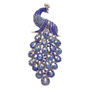 Exquisite peacock brooch pin with blue crystals and gold-plated alloy for elegant women