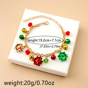 Detailed view of adjustable Christmas bracelet with bells and festive charms