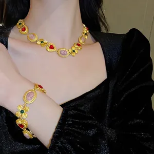 Vintage court style necklace set with cameo portrait and red heart gems in gold finish