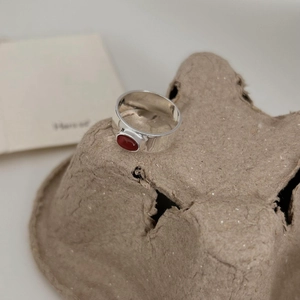 Minimalist 925 sterling silver ring with oval red agate on textured tray