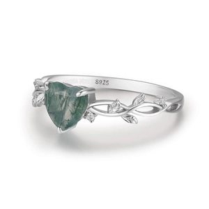 Macro detail of S925 sterling silver stamp and moss agate heart on the leaf ring