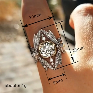 Unique crown ring with geometric hollow design and round sparkle center stone